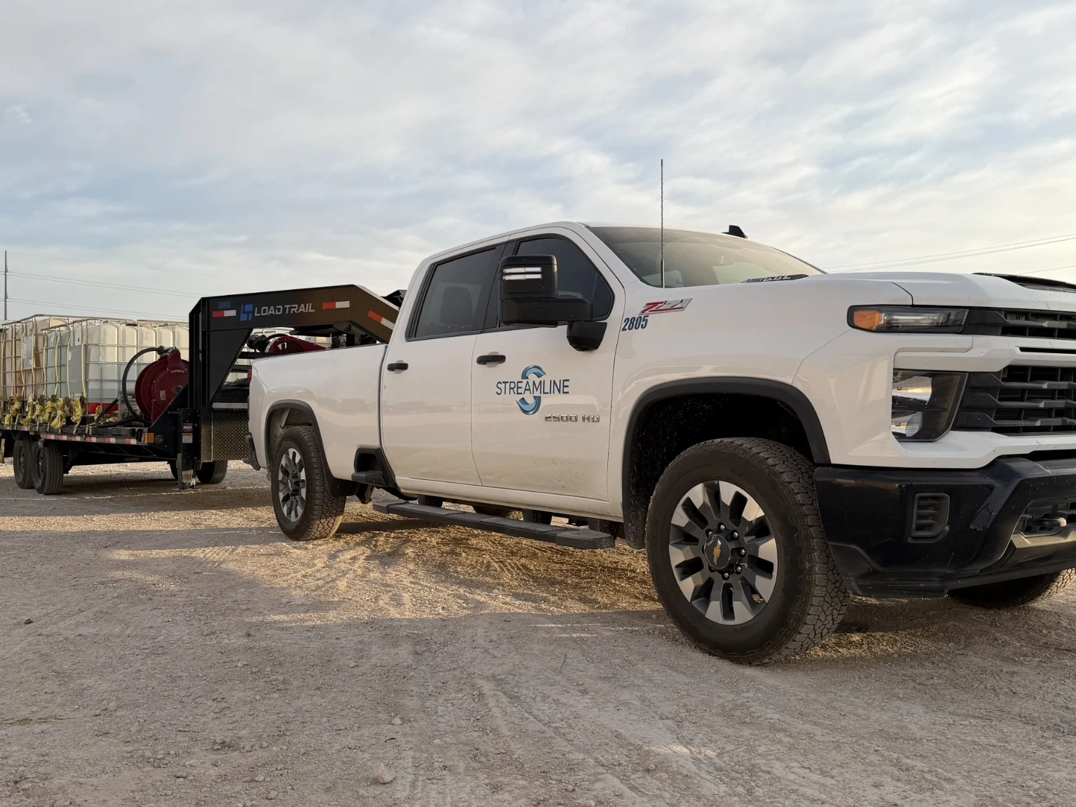 Streamline Industrial work truck and trailer on location